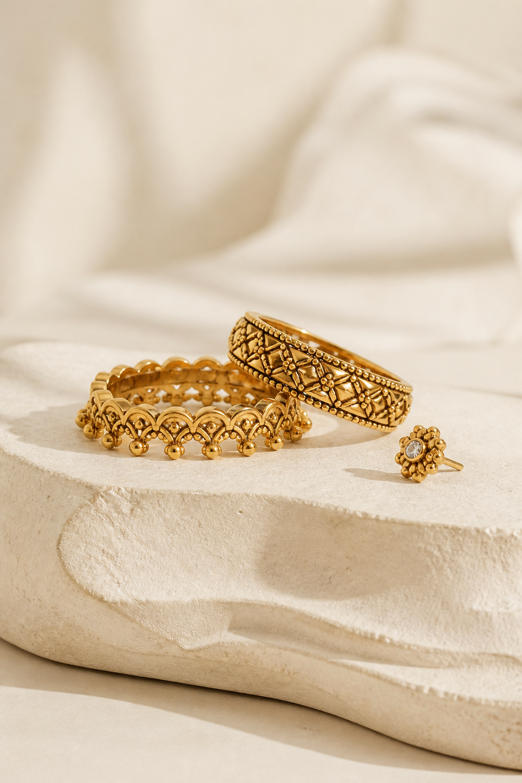 Handcrafted gold rings and nose pin from the jewellery collection